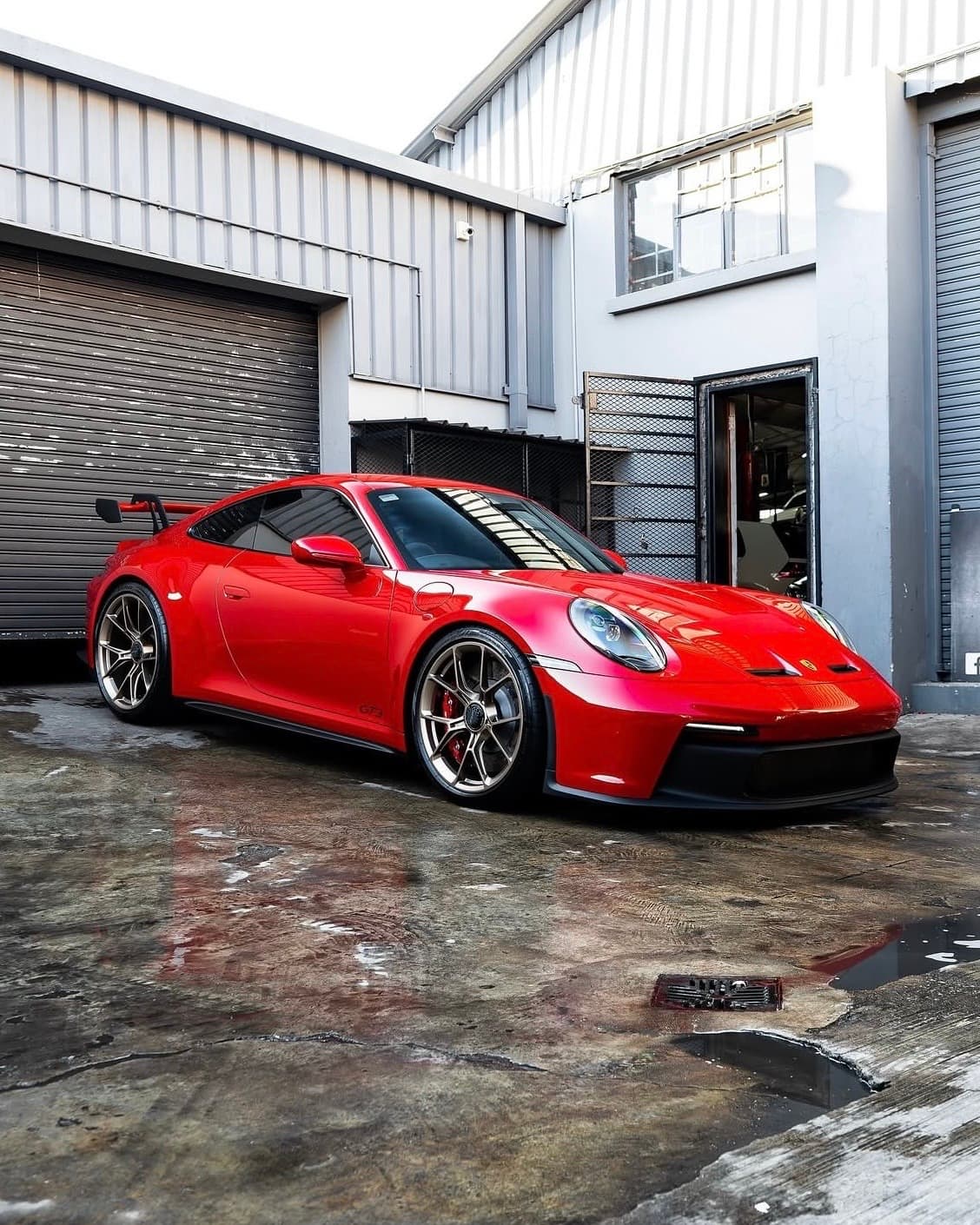 Red Porsche 911 GT3 photographed at The 03 Collective